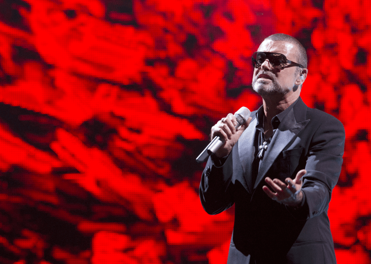 George Michael performing at AIDS Charity event in Paris.