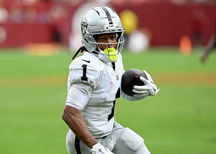Tre Tucker of the Las Vegas Raiders scores a fourth-quarter touchdown against the Washington Commanders at Northwest Stadium in Landover, Maryland, on September 21, 2025.
