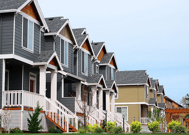A row of newly built townhouses in a residential area