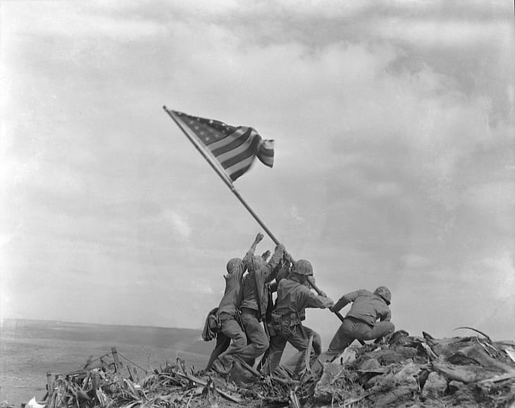#68. Photograph of Marines raising a U. S. flag on Mount Suribachi on the island of Iwo Jima