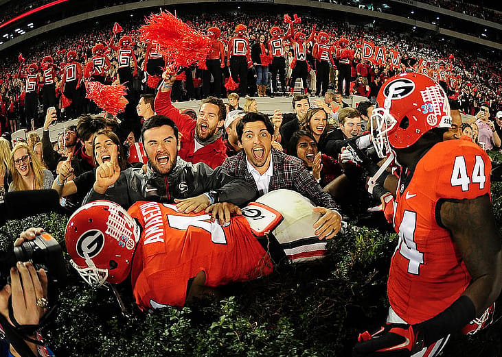 Chuks Amaechi #41 of the Georgia Bulldogs celebrates with fans after the game against the Missouri Tigers on October 17, 2015 in Atlanta, Georgia.