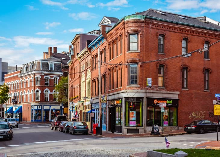 Cars on cobblestone streets in Portland, Maine.