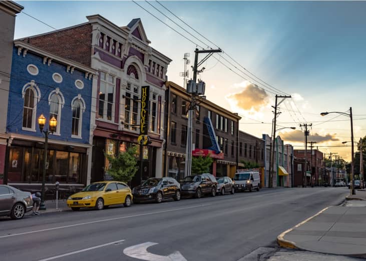 Cars parked next to historic buildings in Lexington, Kentucky.