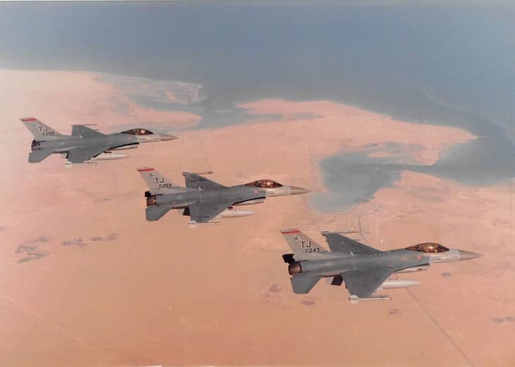 Pictured: Col. Bruce "Baghdad" Cox, 307th Bomb Wing commander, Barksdale Air Force Base, Louisiana, flies his F-16 Fighting Falcon in formation with two other jets in Southwest Asia during operations Desert Shield and Desert Storm