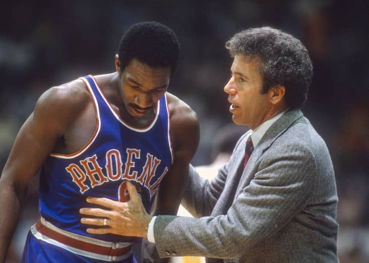 Head coach John MacLeod of the Phoenix Suns talks with Walter Davis during a game