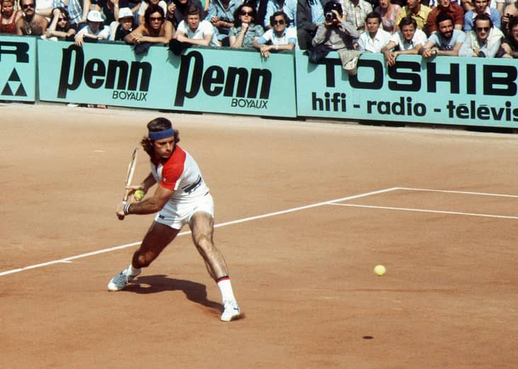 Guillermo Vilas prepares a backhand in his match against Polish player Wojtek Fibak in 1977.