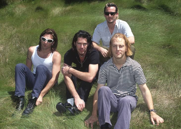 Rodney Browning Cravens, J.R. Richards, Scot Alexander, and George Pendergast of Dishwalla pose.