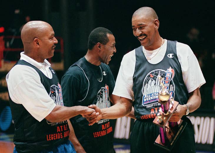 George Gervin receives congratulations from Randy Smith and Jo Jo White