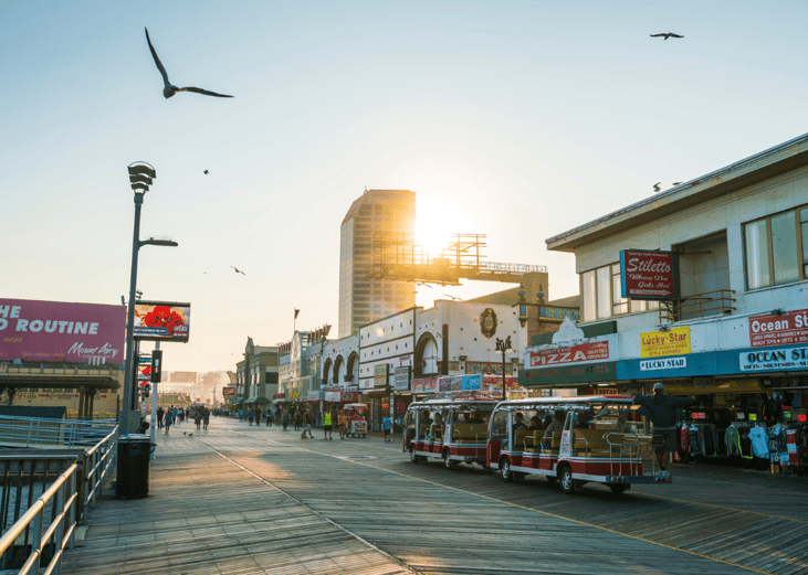 Atlantic City boardwalk shops and people.