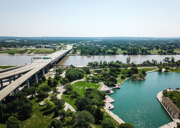 A bridge and waterway going through Omaha, Nebraska.