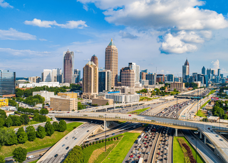 The downtown Atlanta, Georgia, skyline with heavy traffic on the highway