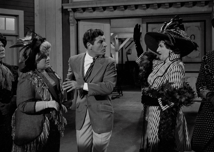 Hermione Gingold, Peggy Mondo, Robert Preston, and Sara Seegar in "The Music Man".