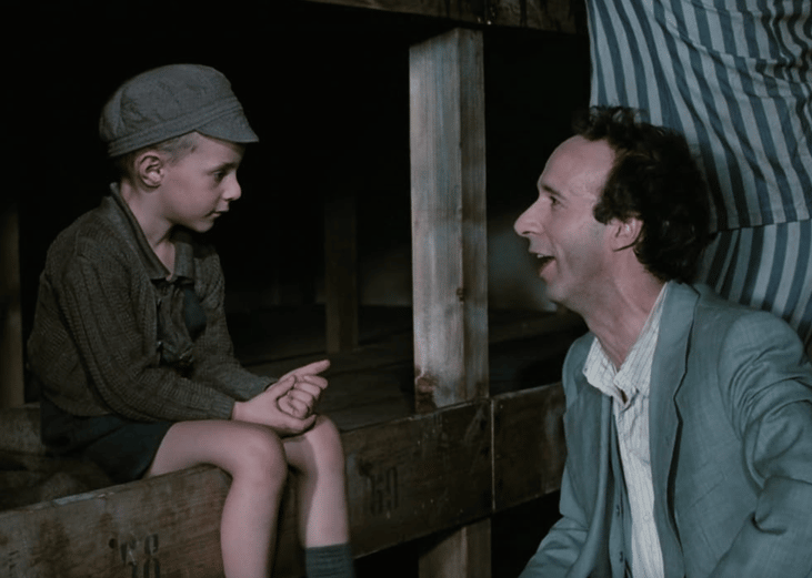 Roberto Benigni and Giorgio Cantarini in Life Is Beautiful.