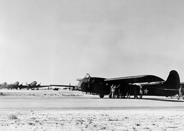 Pictured: U.S. Airborne Infantry troops loading a transport glider (Waco CG-4) which will be used in maneuvers in the southwestern United States, 1942