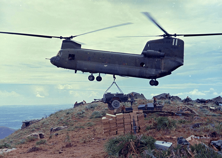 Pictured: CH47 Chinook helicopter lowers a water trailer to the hilltop camp of the 81mm Mortar Section, 2nd Battalion, 327th Infantry, 101st Airborne Brigade, 1967