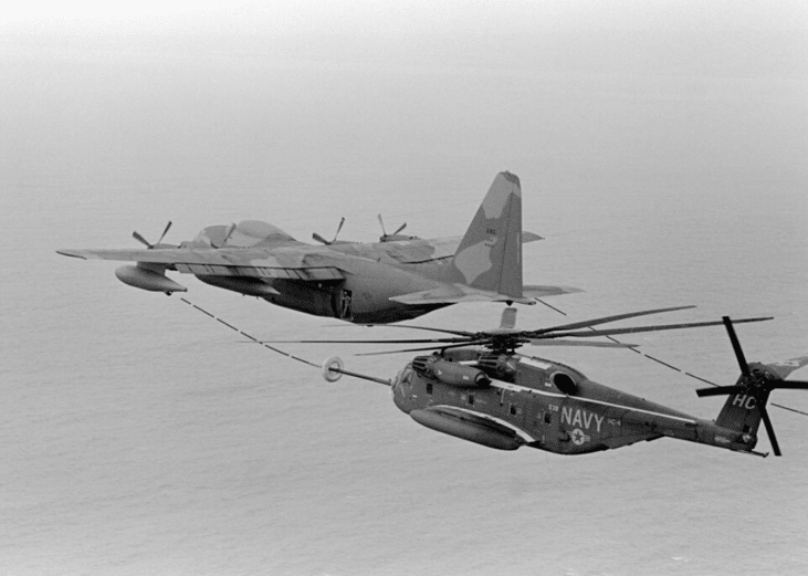 Pictured: An air-to-air view of a CH-53 Sea Stallion helicopter during refueling operations with a KC-130 Hercules aircraft