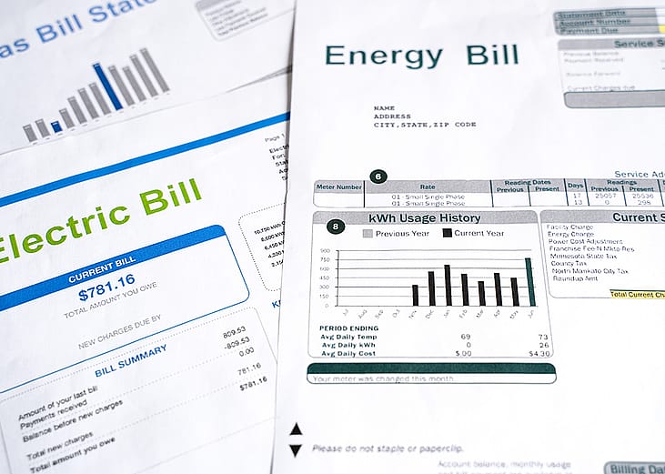 Closeup of monthly energy bills.