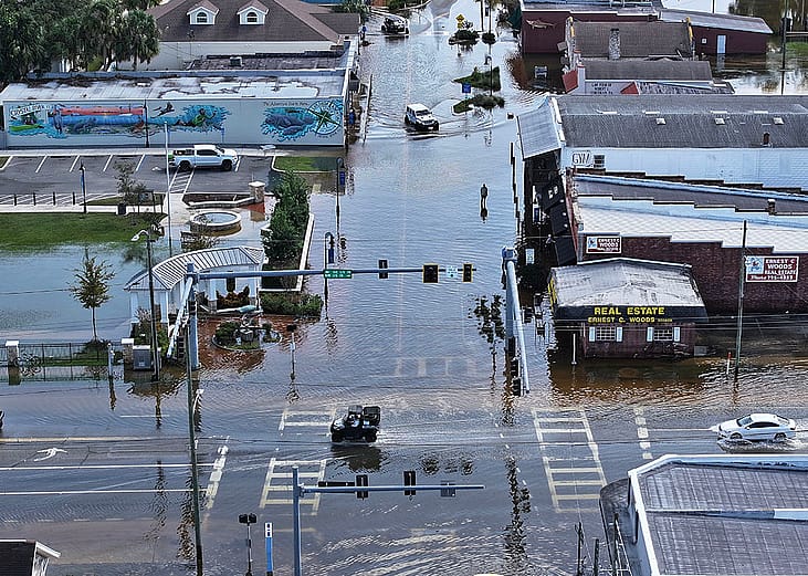 Aerial view of flood waters on the main street after Hurricane Helene passed offshore on September 27, 2024 in Crystal River, Florida. 
