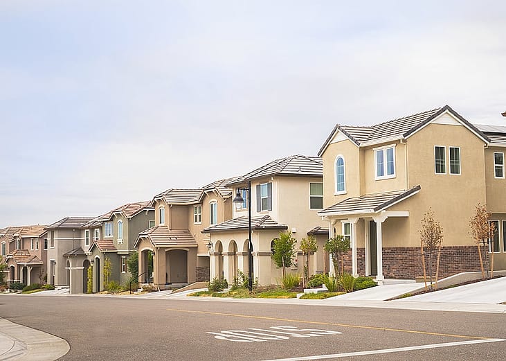 A row of double story suburban homes.