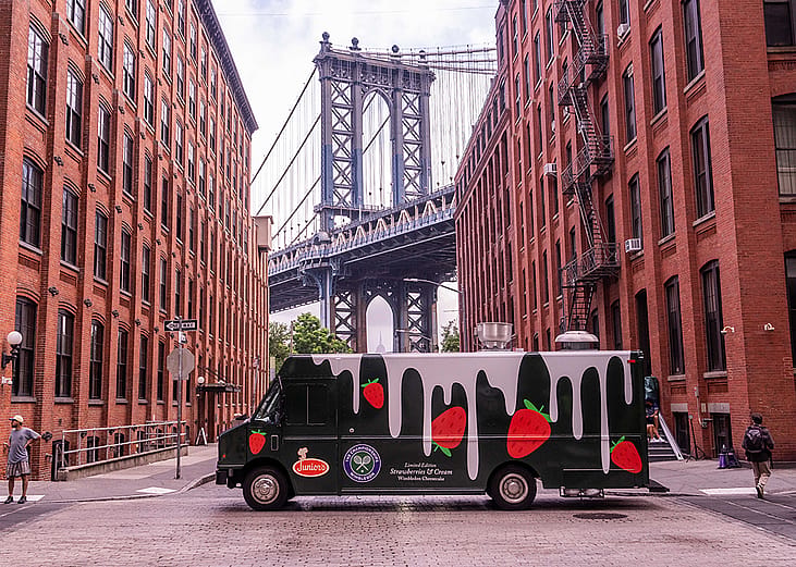 Former tennis pro, John Isner, brought the flavour of The Championships, Wimbledon, to New York, in a food truck serving strawberries and cream mini cheesecakes.