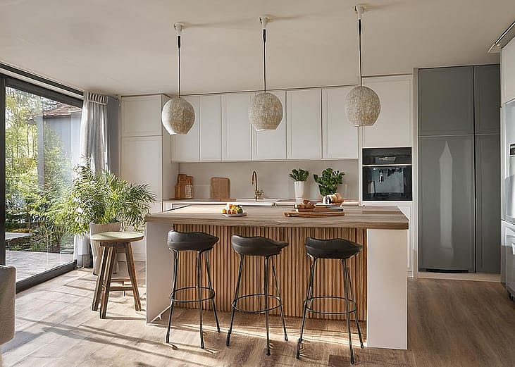 A stylish modern interior of a home kitchen.