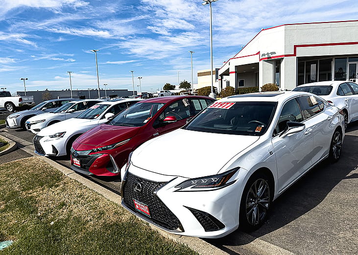 Row of used cars for sale.