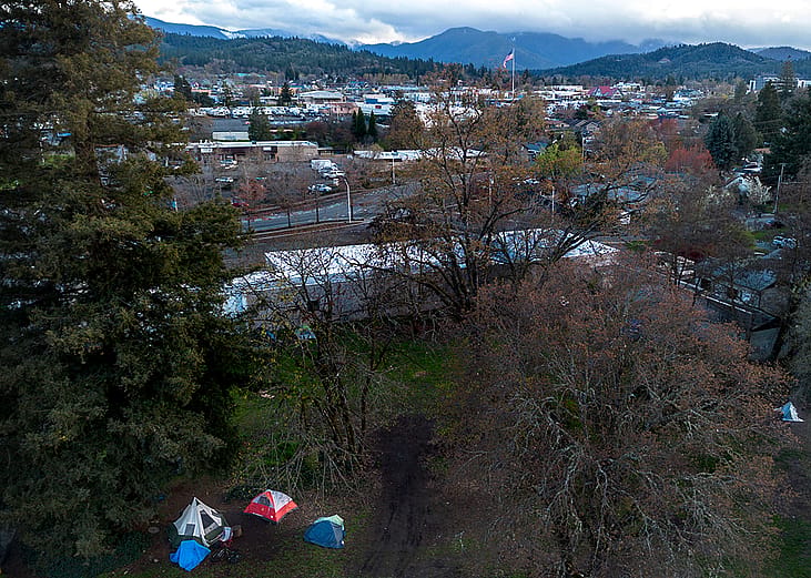 Unhoused people have set up a tent community at Riverside Park in Grants Pass, Oregon.