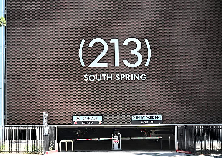 City area code "213" in South Spring on the LA Times parking garage facing Broadway in Los Angeles, California.
