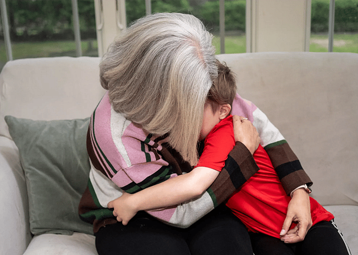 Terri Joyce hugging her son.