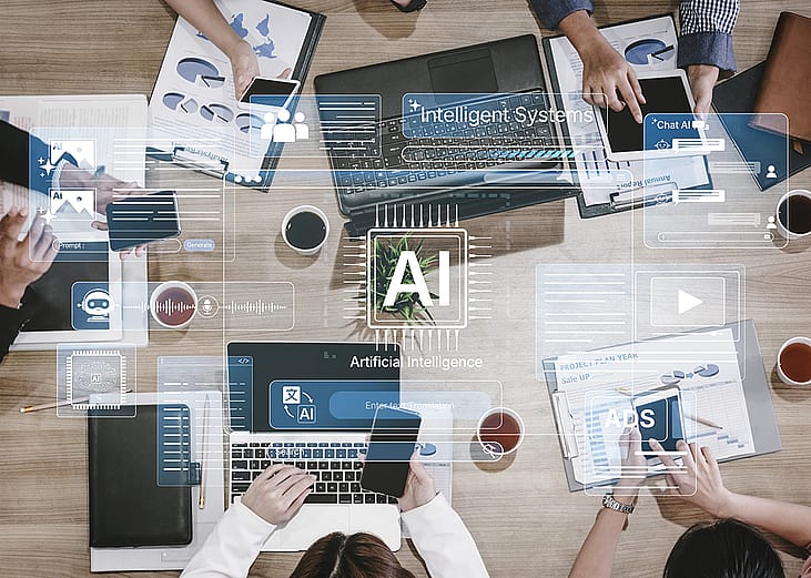 A business team meeting at a table illustrated with AI holographic effects.