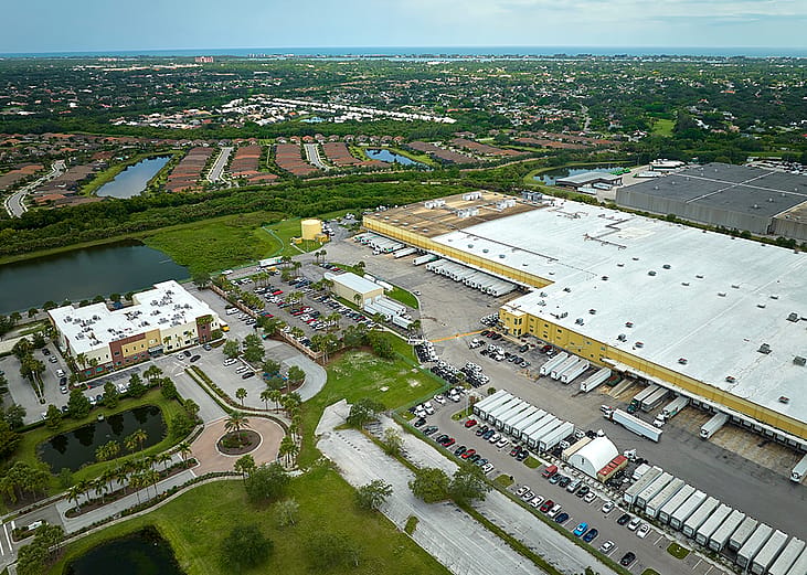 Aerial view of large commercial loading bay for delivery trucks in Sarasota, Florida.