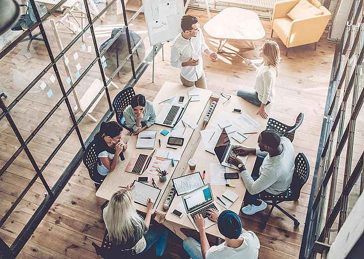High-angle view of a creative business team in a meeting.