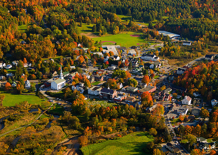 Aerial view of a rural village in Stowe, Vermont during fall.
