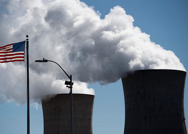 Steam rises out of the nuclear plant on Three Mile Island, with the operational plant run by Exelon Generation, in Middletown, Pennsylvania on March 26, 2019, forty years after the three mile island meltdown.