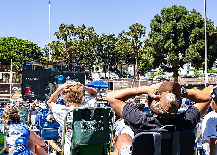 Audience put their hands on their heads in shock at the 2023 Little League World Series in El Segundo, California.