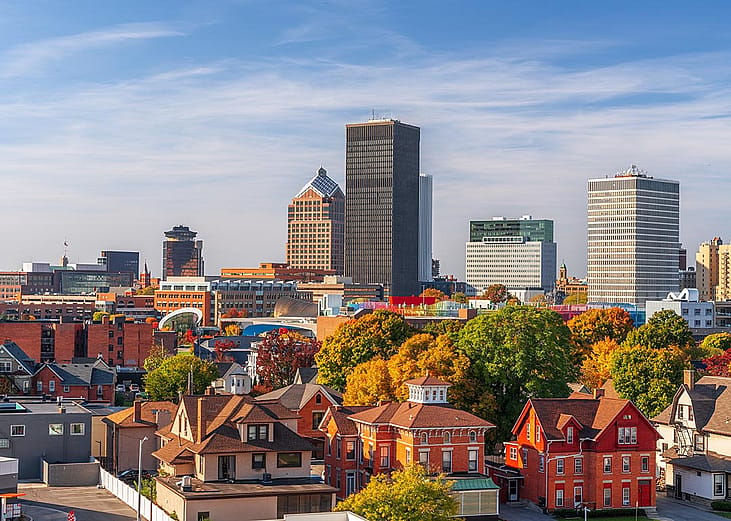 Rochester, New York, USA downtown city skyline colorful in early autumn season.