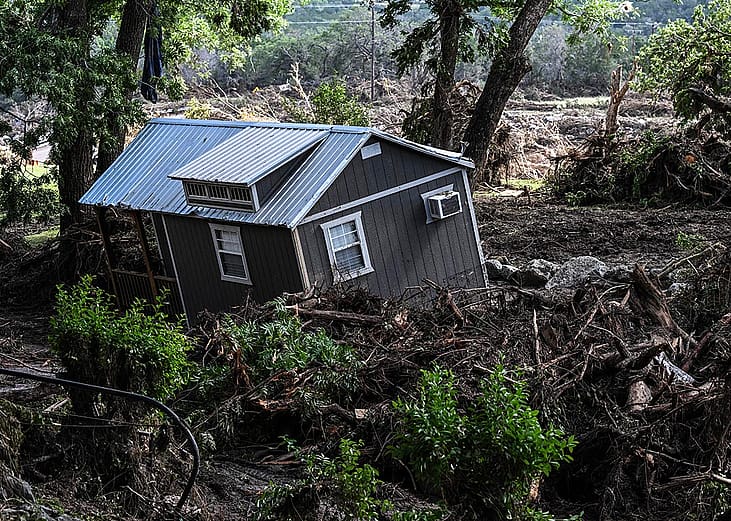 A damaged house is seen near the Guadalupe River in Hunt, Texas, on July 8, 2025, following severe flash flooding over the July 4 holiday weekend. 
