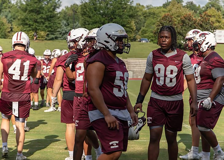 Roanoke College's football players during a practice drill.
