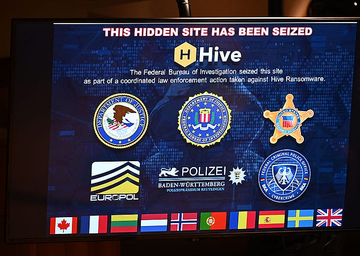 A sign displaying a seized hidden site during a press conference to announce an international ransomware enforcement action, at the Justice Department in Washington, DC, on January 26, 2023. 