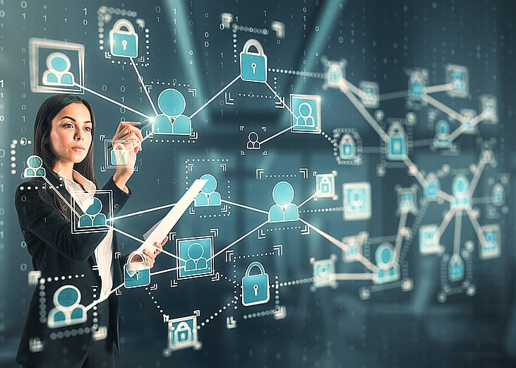 A businesswoman interacting with a 3D holographic network of people concept technology.