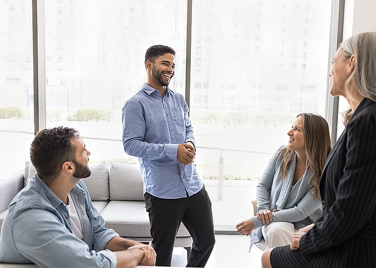A company team laughing during their break.