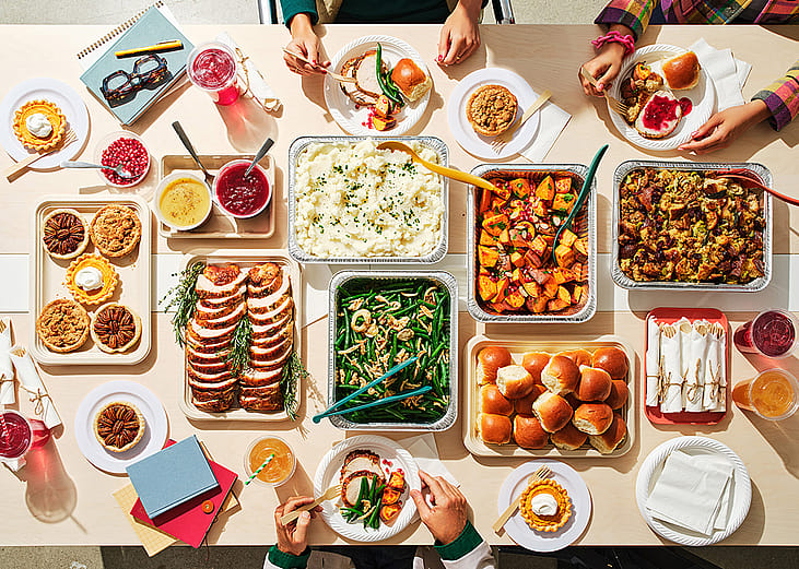 Various dishes for a holiday office party tablescape.