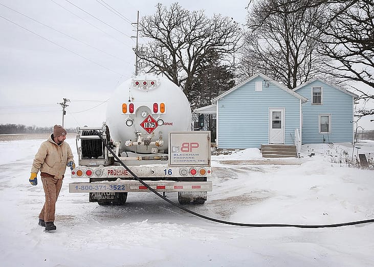 Mark Burger of Blackhawk Propane delivers propane to a rural home on January 24, 2014 near Clinton, Wisconsin.