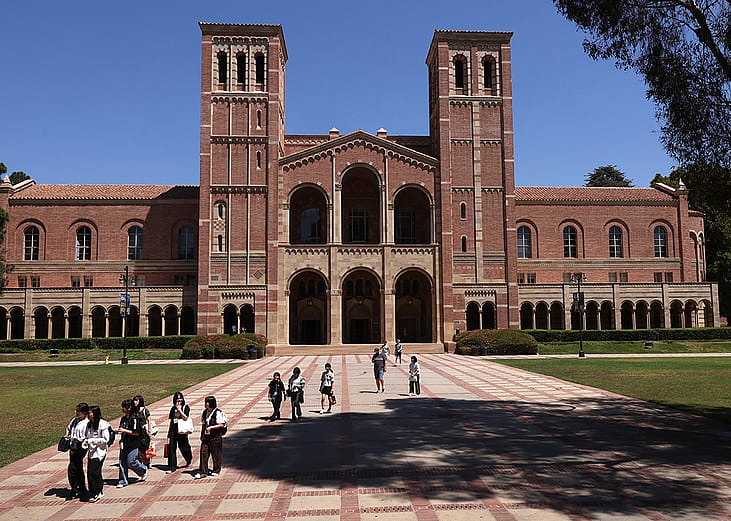 Students walking through Dickson Plaza by the Royce Hall on the UCLA campus in Westwood, California.