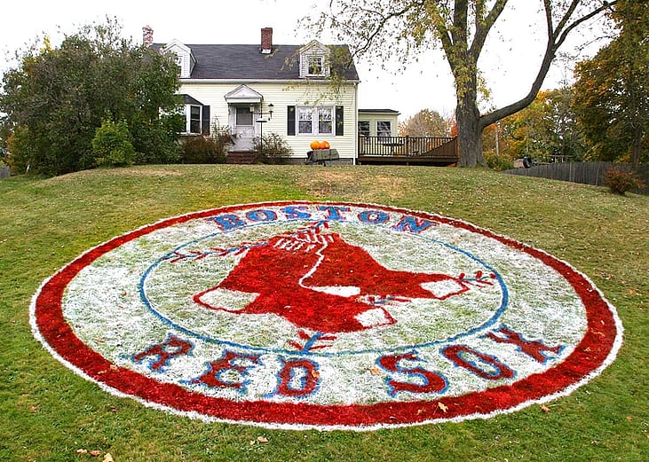 The Red Sox emblem painted on the front lawn of a home at 21 Pine Haven Terrace in South Portland.