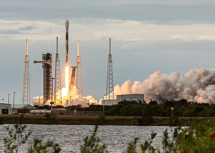 A SpaceX Falcon 9 rocket lifts off from launch pad 40 at the Cape Canaveral Space Force Base in Florida.