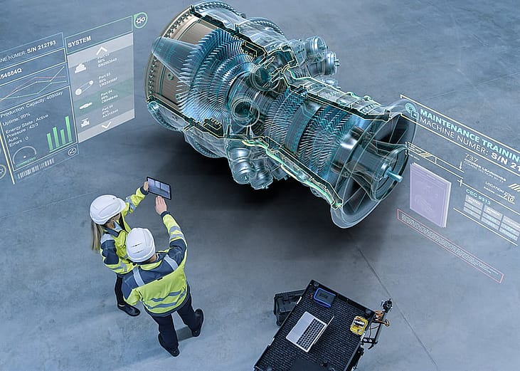 Aircraft engineers using augmented reality software for jet engine diagnostics.