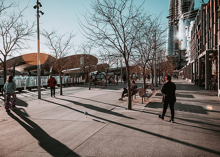 People along a walkway during wintertime.