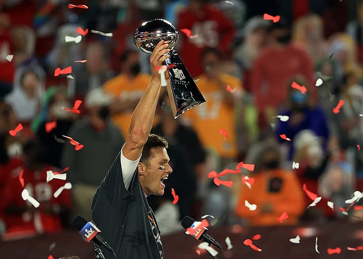 Tom Brady holding up a trophy after winning uper Bowl LV at Raymond James Stadium on February 07, 2021 in Tampa, Florida.