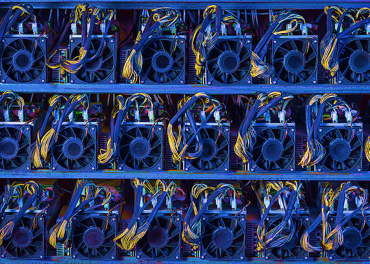 Fans powering a cryptocurrency farm.